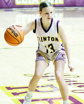 No. 13 Hannah Miller dribbles the ball up the court during Clinton’s eighth-grade game against Anadarko. CDN |Sam Goodwyn