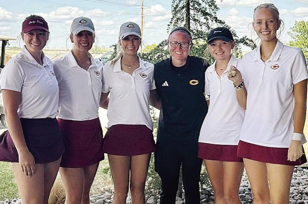 The Clinton Lady Reds golf team is all smiles after it clinched a spot in the Class 4A State Tournament. Pictured, from left, are Paige Pugh, Grace Meacham, Addison Newcomb, Coach Tasha Marshall, Rylee Cummins and Addyson Littke. CDN | Courtesy photo