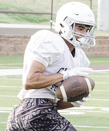 JJ Ruiz catches the ball in a drill during the first day of spring practice Monday. CDN | Sam Goodwyn