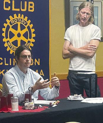 Architect Andrew Stone, left, and Jason Smith speak to the members of the Clinton Rotary Club about plans for revitalizing part of downtown Clinton at a recent meeting. CDN | Shiann Dawson