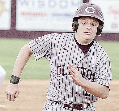 Dyson Moss hustles to third during Clinton’s home game against Kingfisher. CDN | Sam Goodwyn