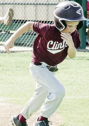 Timmy Sorter hustles to first during Clinton’s baseball game in the OK Kids 8U Baseball State Tournament. CDN |Sam Goodwyn