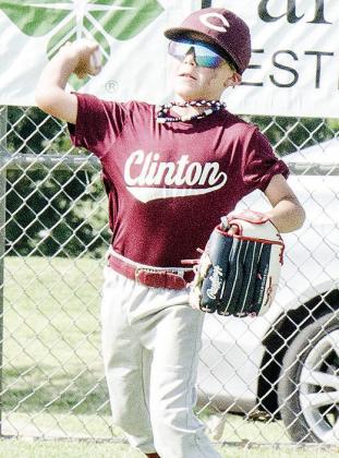 Milo Hemingway throws the ball during Clinton’s baseball game in the OK Kids 8U Baseball State Tournament. CDN |Sam Goodwyn