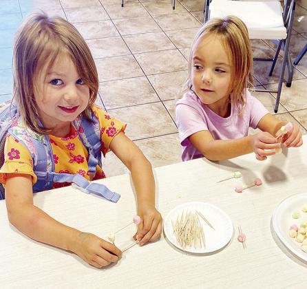 New Cloverbud members to the Western Oklahoma Christian School 4-H Club Avery Nickel, left, and Grace Thomas build structures from marshmallows and toothpicks during the club’s October meeting. CDN | Courtesy photo