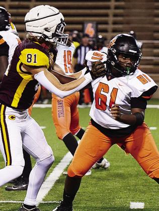 Clinton’s Ben Daugherty blocks a defender during the Red Tornadoes’ senior night game against the Douglass Trojans. CDN | Micah Ashcraft