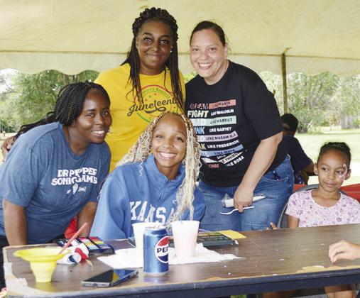 From left, Jamie Thompson, Peyton Clonce, Chasity Thompson, Judy Dowdy, and Araceli Talamantes take part in the Juneteenth celebration. CDN | Christian Jacobsen