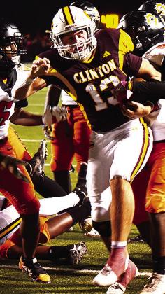 No. 13 Vince Jones fights his way into the end zone for the touchdown against Douglass in Clinton’s final game of the regular season. CDN | Micah Ashcraft