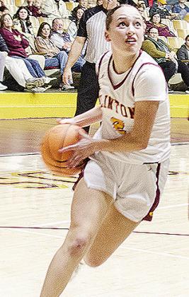 Clinton’s Paisley Ruyle drives the ball toward the hoop during the Lady Reds’ game against Blanchard Friday in the Tornado Dome. CDN | Sam Goodwyn
