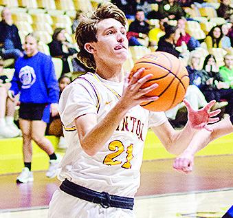 No. 21 Snider Dowdell goes up for a layup against Harrah at the Tornado Dome. CDN | Sam Goodwyn