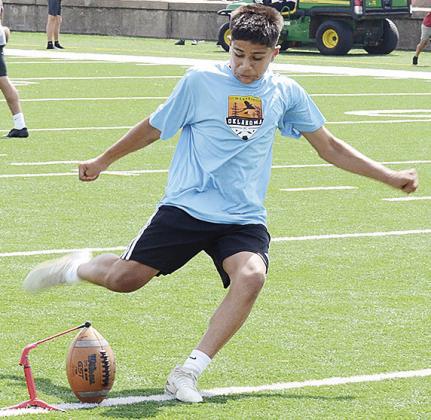 Clinton’s Ruben Martinez practices kicking field goals during practice Monday in the Tornado Bowl. CDN | Sam Goodwyn