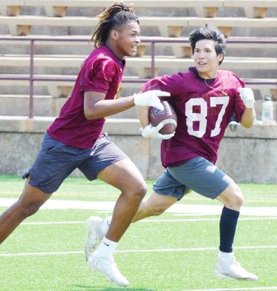Reds pick up snaps in scrimmage