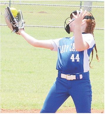 Mooreland’s Kameron Highfill reaches out and secures the out during the Lady Cats’ game against the Morrison Magic Thursday in the OK Kids 8U State Softball Tournament at Schumacher Fields at Acme Brick Park. CDN | Sam Goodwyn