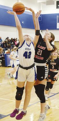 CBA’s Mia Horn battles with a defender for the ball during the Lady Crusaders’ home game against Cheyenne-Reydon Tuesday. CDN | Sam Goodwyn