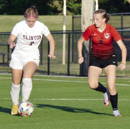 CHS soccer teams split at Woodward