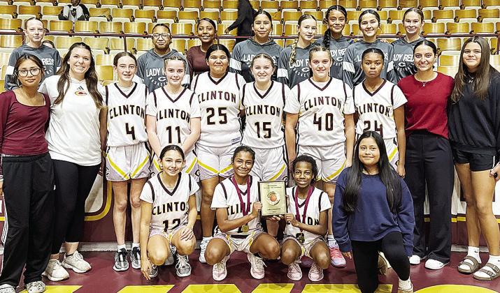 Clinton’s seventh-grade girls’ basketball team is all smiles after finishing first at the CMS Basketball Tournament. Pictured, from left, kneeling are Brielle Villalpando, Catileya Huddlen, Kynnedi Jefferson and Nailleli Jimenez Ramos; middle, Kira Rh