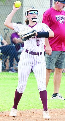 Clinton’s Paisley Ruyle throws the ball back after catching it for the out during the Lady Reds’ home game against Weatherford. CDN | Sam Goodwyn