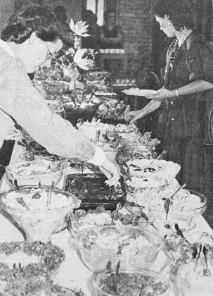 40 YEARS AGO Karen Murray, left, and Debbie Clark filled their plates from some of the 90 different salads offered at a salad luncheon sponsored by the Clinton Cumberland Presbyterian Church.