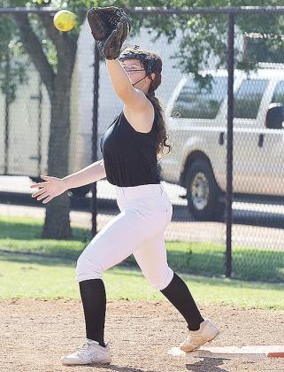 Brinley Taylor catches the ball at first during Clinton’s softball practice Thursday. CDN | Sam Goodwyn