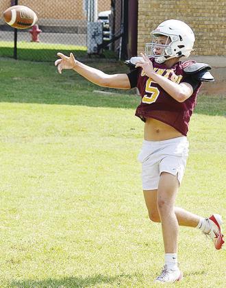 Braxton Garrison works on his aim throwing the ball in a drill during practice. CDN |Sam Goodwyn