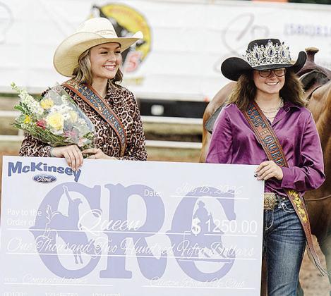 Ally Townsley, left, smiles after being award the 2026 Rodeo Queen Award from last year’s winner Tailee Finnell prior to the start of the rodeo Saturday at the Clinton Round-Up Club Arena. CDN | Sam Goodwyn