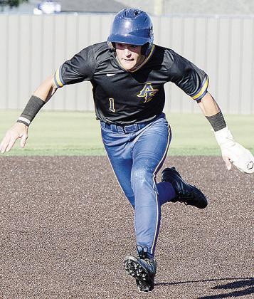 No. 1 Rylan Moore goes into a slide as he sprints toward third during A-B’s state quarterfinal game against Wright City in Shawnee. CDN | Sam Goodwyn