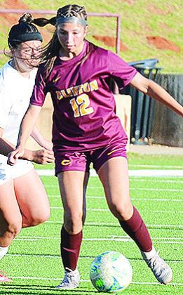 No. 12 Maddi McAtee outraces a Newcastle defender to the ball during Clinton’s win over the Lady Racers. CDN | Sam Goodwyn