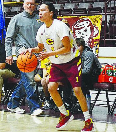 Clinton’s Dyson Ellis dribbles the ball as he looks for an open teammate against Canute. CDN | Sam Goodwyn