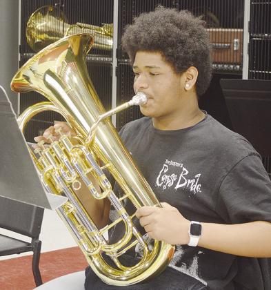 Kristen Bennett keeps his tempo while working on a traditional marching song that will be performed in contest. CDN | Micah Ashcraft