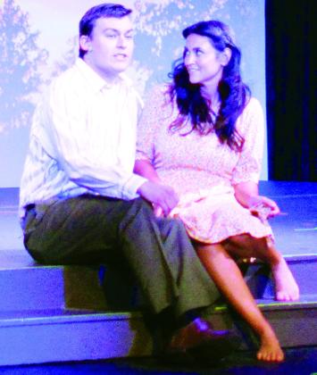 Wesley Javorsky, left, as Jimmy Ray and Blair Barnett Green as Alice Murphy perform together during the Southwest Playhouse’s production of “Bright Star” Wednesday evening. CDN | Micah Ashcraft