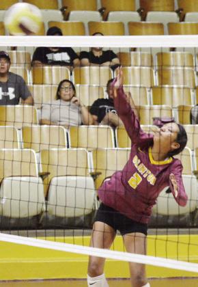 Lady Reds battle close against Tuttle