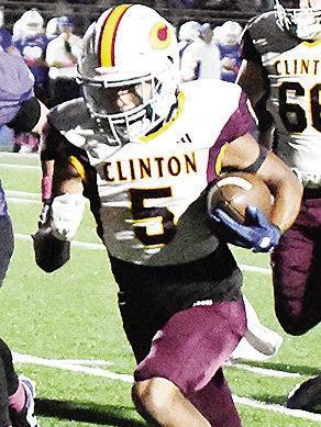 Clinton’s Jesus Gutierrez heads into the end zone for one of his touchdowns in the Red Tornadoes’ road win Friday over Bridge Creek. CDN | John Kinsey