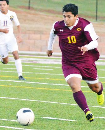 Clinton midfielder Marco Gonzalez dribbles up the field in a game against Chickasha last year. Gonzalez nearly put up 20 goals and 20 assists across the 2018-2019 seasons. CDN | Collin Wieder
