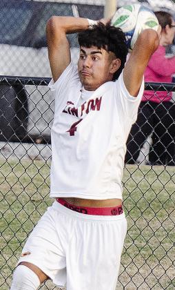 No. 4 Ruben Labastida puts all of his might behind his throw as he prepares to send the ball back into play during Clinton’s win over Weatherford. CDN | Sam Goodwyn