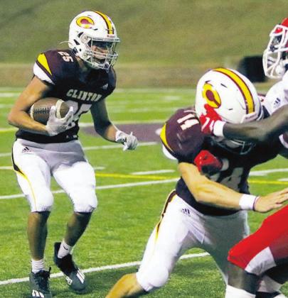 Garrison Rhoads (25) looks to take the ball up field versus Cache