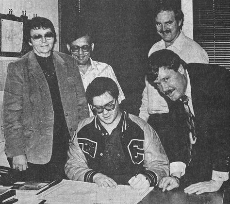 40 YEARS AGO Signing a “Letter of Intent” to play football for the Central State University Bronchos at Edmond was standout Clinton High School Red Tornado tackle Richard Rose, shown here with CSU offensive coordinator John McGivern, at right. Watchin