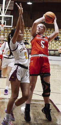 Clinton’s Lillian Lime defends against a Lindsay player during the Lady Reds’ game against the Leopardettes in the Tornado