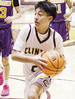 Clinton’s Santiago Izaguirre drives to the basket during the eighth-grade boys’ game against Anadarko in the Tornado Dome. CDN |Sam Goodwyn