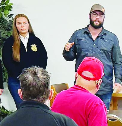 Annabelle Rose, left, and Arapaho-Butler Ag Teacher Mitchell Hunter give a presentation to a group of locals with questions ahead of the Sept. 9 bond issue vote for a new Ag building. CDN | Courtesy photo