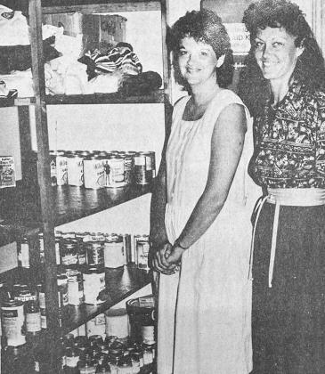 40 YEARS AGO Although a few items had been received by the Department of Human Services Food Bank located at the DHS office in west Clinton, it was only a small amount compared to that needed to meet the growing needs in the area. DHS staffers Lissa Lee, left, and Vickie Kenney were shown going over the food stores.