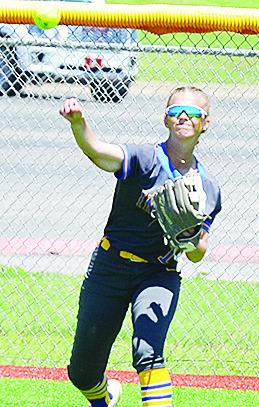 No. 1 Kylin Oakes throws the ball in during the spring regional tournament in Elk City. CDN | Sam Goodwyn