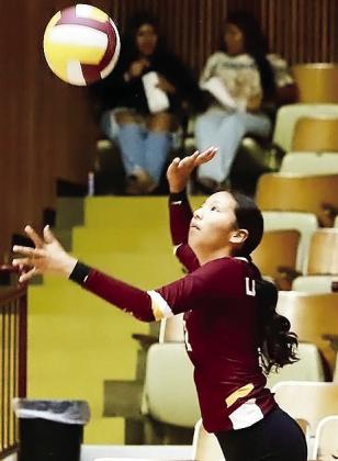 Clinton’s Ella Redshin focuses on the ball as she prepares to serve during the Lady Reds’ match against Blair in the Tornado Dome. CDN | Kerri Staggs
