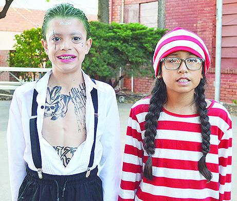 In the 9-year-old category, Jorden Taplin, left, won first place as Joker from Suicide Squad, and Geneveieve Goodblanket, won second place as Waldo.