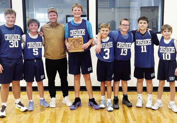 Corn Bible Academy’s seventh- and ninth-grade boys’ basketball is all smiles after finishing third at the Olustee Basketball Tournament. Pictured, from left, are Lawson Roberson, Graham Murray, Matt Murray, Nathan Cooke, Caleb Clabaugh, Ethan Cooke, B