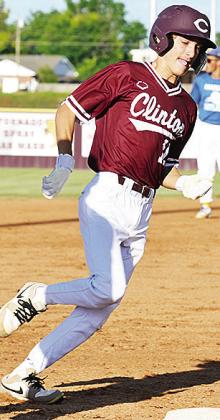 Clinton’s Snider Dowdell rounds third on his way home to score against Arapaho-Butler this summer. CDN | Sam Goodwyn