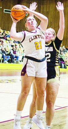 Clinton’s Rhylee Rodebush goes up for a contested layup during the Lady Reds’ home game Friday against Woodward. CDN | Sam Goodwyn