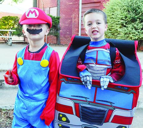 In the 5-year-old category, from left, Asher King as Mario, son of Kayla Krewan, won second place and Ryan Woodall, son of Raven and Jacob Woodall, won first place as Optimus Prime, a Transformer.