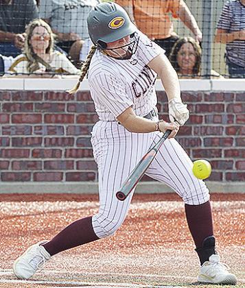 Clinton’s Rhylee Rodebush swings at the ball early in the Lady Reds’ road game Monday against Elk City. CDN | Sam Goodwyn