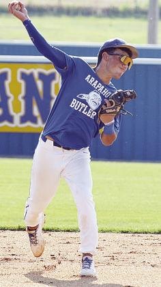 Arapaho-Butler’s Orsan Jubara throws the ball with all of his might to first for the out during the Indians’ game against Clinton. CDN | Sam Goodwyn