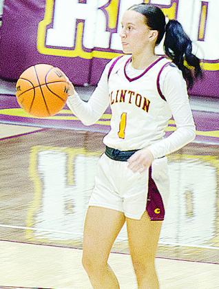 No. 1 Rhylee Chagolia takes the ball up the court during Clinton’s season opener against Harrah. CDN | Sam Goodwyn