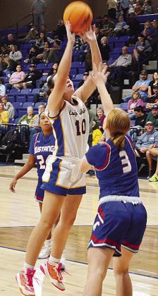 Arapaho-Butler’s Katelyn Garibay lays the ball up over a defender during the Lady Indians’ home game against Fort Cobb. CDN | Sam Goodwyn